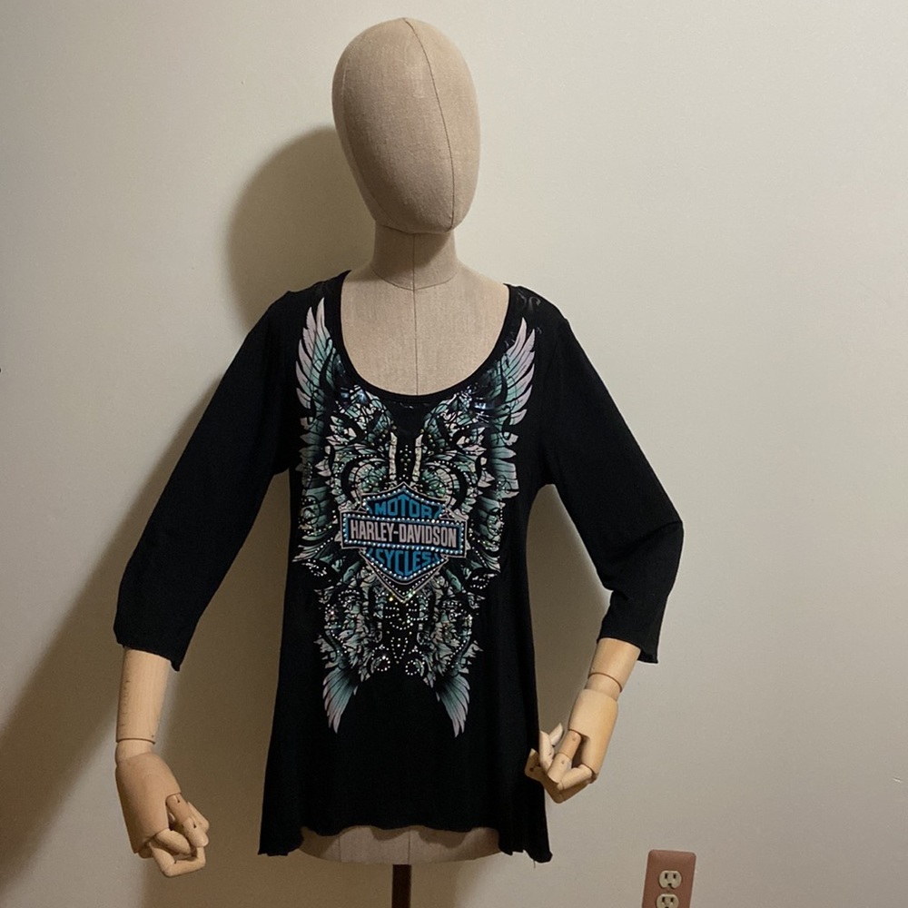 Woman’s Large long sleeve black Harley Davison shirt.  D18